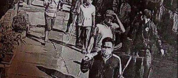 Hình ảnh nhóm côn đồ được camara ghi lại.  - Sputnik Việt Nam