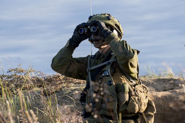 Солдат во время учений НАТО Saber Strike. Архивное фото - Sputnik Việt Nam