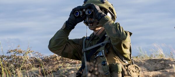 Солдат во время учений НАТО Saber Strike. Архивное фото Солдат во время учений НАТО Saber Strike. Архивное фото - Sputnik Việt Nam