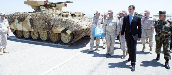 Tổng thống Syria Bashar Asad vừa đến thăm căn cứ không quân Nga ở Hmeymim thuộc tỉnh Latakia - Sputnik Việt Nam