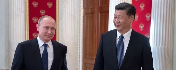 Tổng thống Nga Vladimir Putin và Chủ tịch Trung Quốc Tập Cận Bình - Sputnik Việt Nam