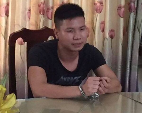 Đối tượng Trần Cao Thái tại cơ quan công an. - Sputnik Việt Nam