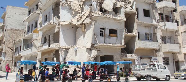 Разрушенное здание в сирийском городе Идлиб - Sputnik Việt Nam