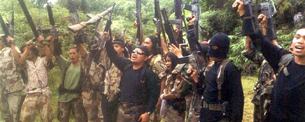 Боевики филиппинской воинственной террористической исламистской группы Абу Сайяф. Архивное фото - Sputnik Việt Nam