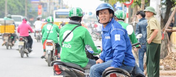 Hà Nội là địa phương nằm trong đề án thí điểm của Uber, Grab. Hà Nội là địa phương nằm trong đề án thí điểm của Uber, Grab. - Sputnik Việt Nam