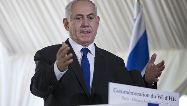 Israeli Prime Minister Benjamin Netanyahu gestures as he delivers a speech during a ceremony commemorating the 75nd anniversary of the Vel d'Hiv roundup, Sunday, July 16, 2017 in Paris - Sputnik Việt Nam