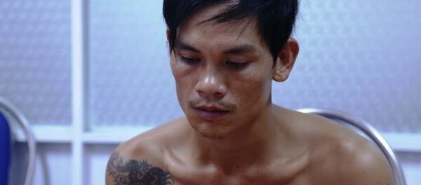 Đối tượng Trung, người trực tiếp cầm súng bắn người đã ra đầu thú ngảy 28/7. - Sputnik Việt Nam