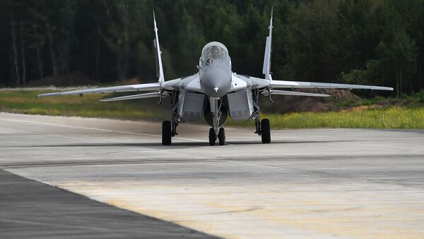 Многоцелевой истребитель МиГ-29 во время испытаний на полигоне АО Российская самолетостроительная Корпорация МиГ в Московской области - Sputnik Việt Nam