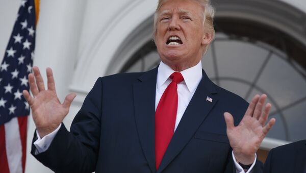 President Donald Trump speaks to reporters before a security briefing at Trump National Golf Club in Bedminster, N.J., Thursday, August 10, 2017 - Sputnik Việt Nam