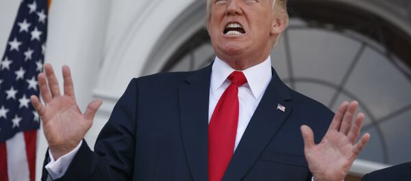 President Donald Trump speaks to reporters before a security briefing at Trump National Golf Club in Bedminster, N.J., Thursday, August 10, 2017 - Sputnik Việt Nam