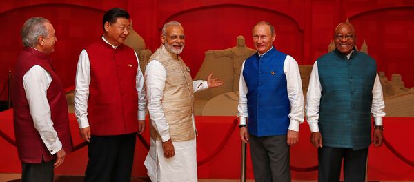(L-R) Brazil's President Michel Temer, Chinese President Xi Jinping, Indian Prime Minister Narendra Modi, Russian President Vladimir Putin and South African President Jacob Zuma pose infront of a sand sculpture ahead of BRICS (Brazil, Russia, India, China and South Africa) Summit in Benaulim, in the western state of Goa, India, October 15, 2016 (L-R) Brazil's President Michel Temer, Chinese President Xi Jinping, Indian Prime Minister Narendra Modi, Russian President Vladimir Putin and South African President Jacob Zuma pose infront of a sand sculpture ahead of BRICS (Brazil, Russia, India, China and South Africa) Summit in Benaulim, in the western state of Goa, India, October 15, 2016 - Sputnik Việt Nam