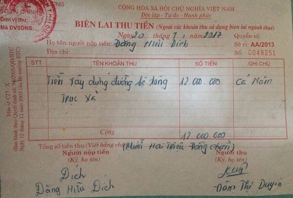 Phiếu thu khoản đóng góp tiền làm đường của người dân xã An Bình. Phiếu thu khoản đóng góp tiền làm đường của người dân xã An Bình. - Sputnik Việt Nam