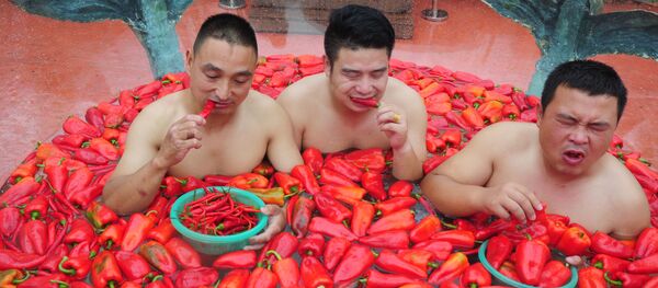 Trung Quốc, tỉnh Hồ Nam. Các thí sinh của cuộc thi … ăn ớt cay. Trung Quốc, tỉnh Hồ Nam. Các thí sinh của cuộc thi … ăn ớt cay. - Sputnik Việt Nam