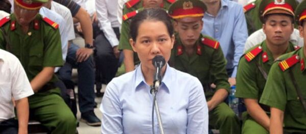 Nguyễn Minh Thu khai đưa cho tổng giám đốc Vietsovpetro 30% lãi suất ngoài hợp đồng, 70% đưa cho kế toán trưởng. - Sputnik Việt Nam