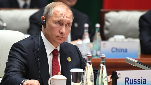 Tổng thống LB Nga Vladimir Putin tại Hội nghị thượng đỉnh lần thứ 9 của nhóm BRICS, ngày thứ 2 - Sputnik Việt Nam