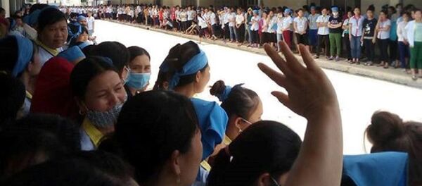 Công nhân đến công ty nhưng không làm việc - Sputnik Việt Nam