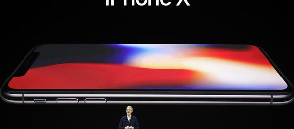 Apple CEO Tim Cook announces the new iPhone X at the Steve Jobs Theater on the new Apple campus, Tuesday, Sept. 12, 2017, in Cupertino, California. Apple CEO Tim Cook announces the new iPhone X at the Steve Jobs Theater on the new Apple campus, Tuesday, Sept. 12, 2017, in Cupertino, California. - Sputnik Việt Nam