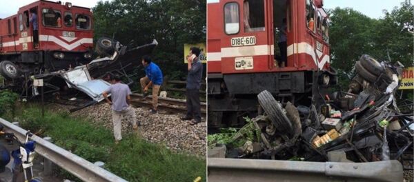 Cú đâm mạnh khiến chiếc xe tải mang BKS 29C-59.491 bị nát bét. Chiếc xe tải bị kéo đi khoảng 500m theo hướng Thường Tín - trung tâm TP Hà Nội. - Sputnik Việt Nam