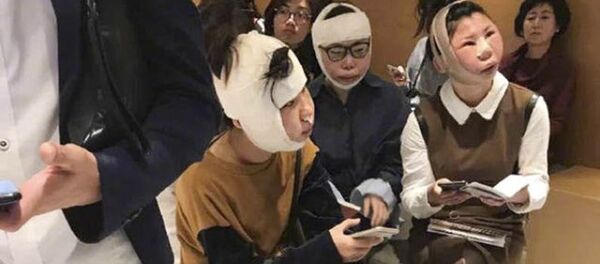 Ba phụ nữ Trung Quốc bị giữ tại sân bay Hàn Quốc sau phẫu thuật thẩm mỹ mặt Ba phụ nữ Trung Quốc bị giữ tại sân bay Hàn Quốc sau phẫu thuật thẩm mỹ mặt - Sputnik Việt Nam