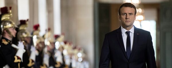 French President Emmanuel Macron walks through the Galerie des Bustes (Busts Gallery) to access the Versailles Palace's hemicycle for a special congress gathering both houses of parliament (National Assembly and Senate), near Paris, France, July 3, 2017. French President Emmanuel Macron walks through the Galerie des Bustes (Busts Gallery) to access the Versailles Palace's hemicycle for a special congress gathering both houses of parliament (National Assembly and Senate), near Paris, France, July 3, 2017. - Sputnik Việt Nam