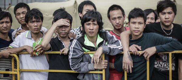 Những người nhập cư trong trại tạm trú ở Golyanovo. Năm 2013 - Sputnik Việt Nam