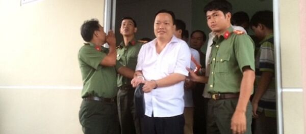 Nguyễn Huỳnh Đạt Nhân , giám đốc Công ty Tây Nam khi bị bắt giữ. - Sputnik Việt Nam