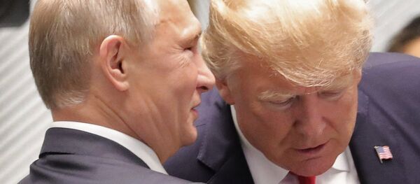 Russian President Vladimir Putin and US President Donald Trump, right, are seen here ahead of the first working meeting of the Asia-Pacific Economic Cooperation leaders - Sputnik Việt Nam