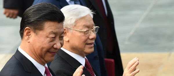 Chủ tịch Trung Quốc Tập Cận Bình và Tổng Bí thư Đảng Cộng sản Việt Nam Nguyễn Phú Trọng tại cuộc họp tại Hà Nội - Sputnik Việt Nam