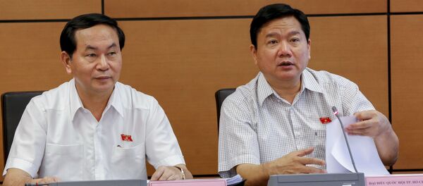 Chủ tịch nước Trần Đại Quang  và Đinh La Thăng - Sputnik Việt Nam