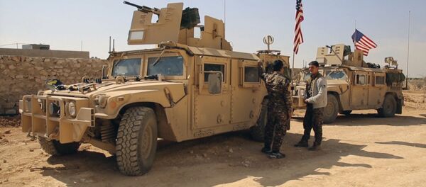 Сирийские и американские военные во время наступления на сирийский город Ракку - Sputnik Việt Nam