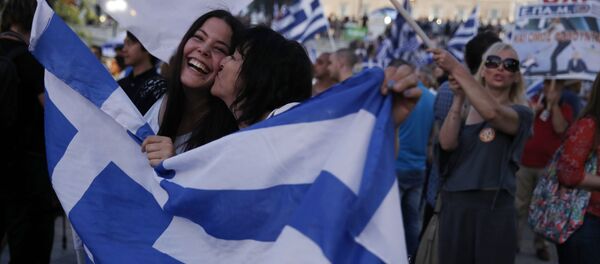 Những người bỏ phiếu không ăn mừng kết quả trưng cầu dân ý ở trung tâm Athens, Hy Lạp - Sputnik Việt Nam