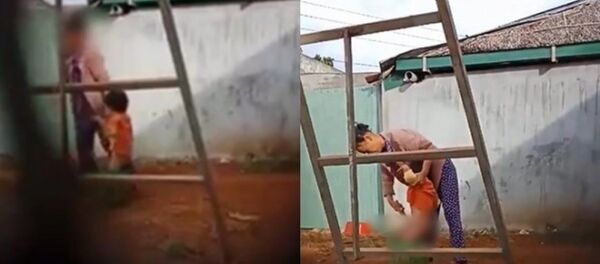 Người phụ nữ bạo hành trẻ em. - Sputnik Việt Nam