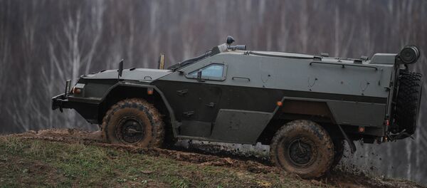 Xe bọc thép dành lực lượng cảnh sát đặc biệt Vystrel (KAMAZ-43269). - Sputnik Việt Nam