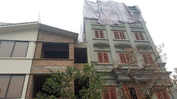 Ngôi biệt thự cao 5 tầng của vợ chồng ông Nguyễn Thanh Hóa có chiều cao, kiến trúc khác biệt  - Sputnik Việt Nam