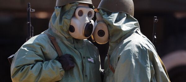 Người đeo mặt nạ phòng độc - Sputnik Việt Nam