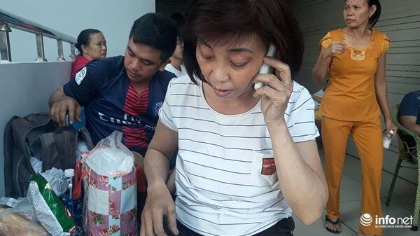 phụ nữ gọi điện ở hiện trườnng - Sputnik Việt Nam