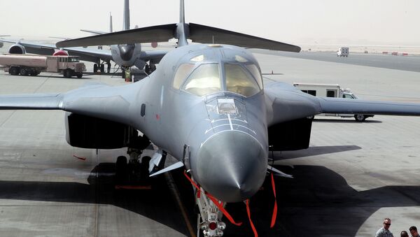 In this photo taken on March 9, 2015, a B-1 bomber is seen at the al-Udeid Air Base in Doha, Qatar - Sputnik Việt Nam