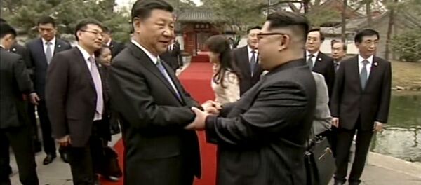 Chủ tịch CHND Trung Hoa Tập Cận Bình và lãnh đạo CHDCND Triều Tiên Kim Jong Un tại Bắc Kinh - Sputnik Việt Nam