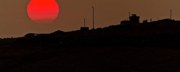 A soldier walks at a Turkish military outpost A soldier walks at a Turkish military outpost - Sputnik Việt Nam