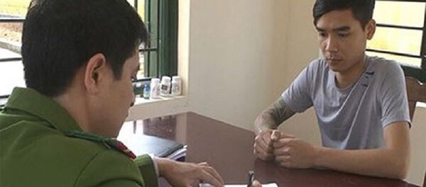 Hoàng Văn Trọng tại cơ quan công an. - Sputnik Việt Nam