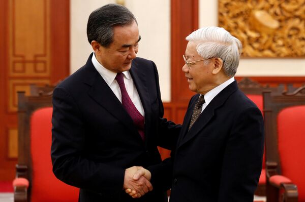 Tổng Bí thư Đảng Cộng sản Việt Nam Nguyễn Phú Trọng và Ngoại trưởng Trung Quốc Vương Nghị. Tổng Bí thư Đảng Cộng sản Việt Nam Nguyễn Phú Trọng và Ngoại trưởng Trung Quốc Vương Nghị. - Sputnik Việt Nam