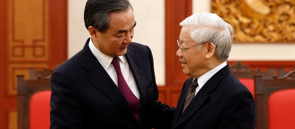 Tổng Bí thư Đảng Cộng sản Việt Nam Nguyễn Phú Trọng và Ngoại trưởng Trung Quốc Vương Nghị. - Sputnik Việt Nam