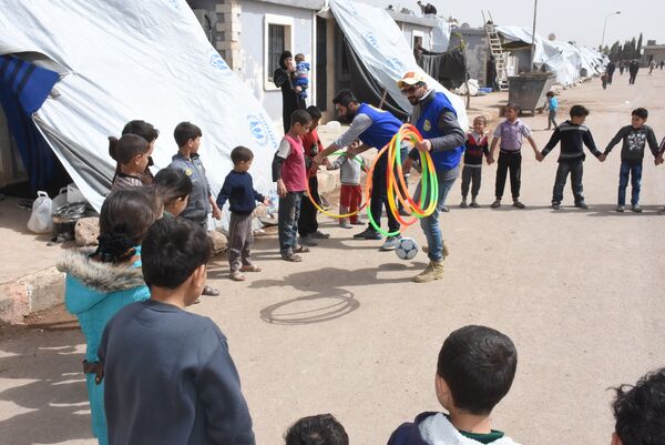 Ngày hội cho trẻ em từ Đông Ghouta trong trại tị nạn Ngày hội cho trẻ em từ Đông Ghouta trong trại tị nạn - Sputnik Việt Nam
