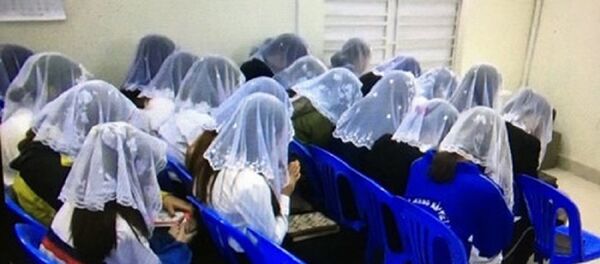 Các tín đồ trong một lần ngồi cầu nguyện ở huyện Thủy Nguyên (Hải Phòng). - Sputnik Việt Nam