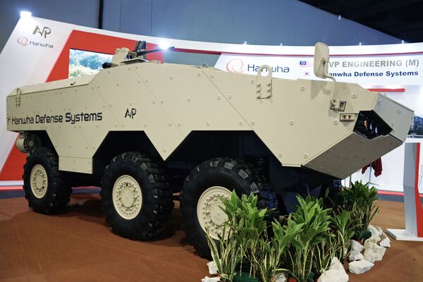 Xe bọc thép trên bánh hơi Tigon 6x6 từ Hanwha Defense Systems (Hàn Quốc). - Sputnik Việt Nam