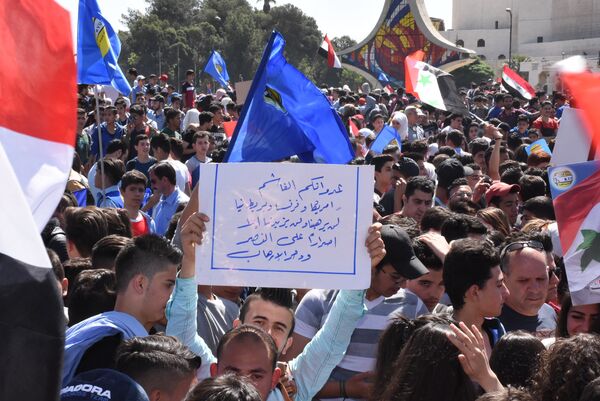 Hơn 50 ngàn thanh thiếu niên Syria đã dự cuộc mít tinh hôm thứ Hai, được tổ chức bởi Liên đoàn thanh niên cách mạng Syria.  - Sputnik Việt Nam