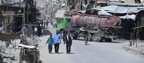 Пригород Дамаска Дума после освобождения от боевиков - Sputnik Việt Nam