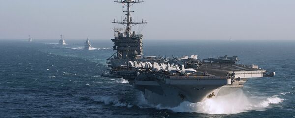 The aircraft carrier group of the United States Navy led by USS Harry S. Truman, front, and a ship escort are seen leaving the port of Norfolk heading for the Middle East - Sputnik Việt Nam