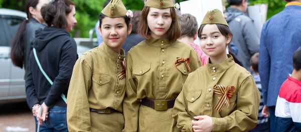 Các thành viên tham gia hành động “Trung đoàn Bất tử” và lễ hội kỷ niệm ở Seoul, Hàn Quốc Các thành viên tham gia hành động “Trung đoàn Bất tử” và lễ hội kỷ niệm ở Seoul, Hàn Quốc - Sputnik Việt Nam