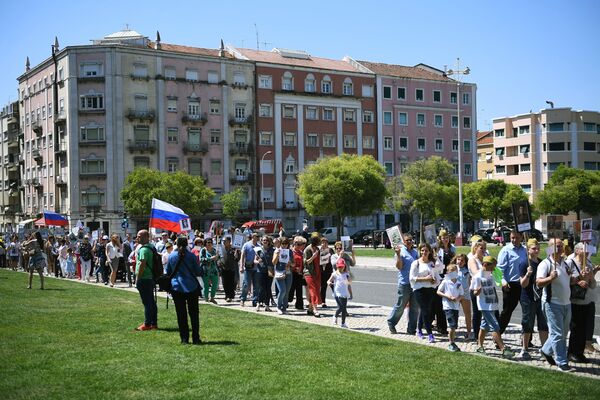 Các thành viên tham gia hành động “Trung đoàn Bất tử” ở Lisbon, Bồ Đào Nha - Sputnik Việt Nam